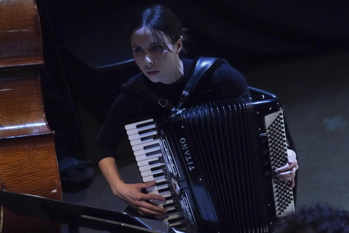 Erica Mancini plays her accordion during a Ukrainian avant garde jazz opera at Bohemian National Hall in New York.