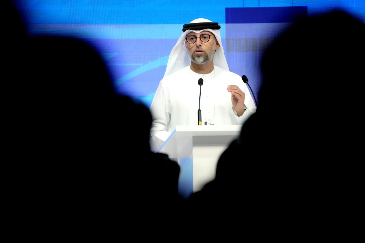 FILE - United Arab Emirates Energy Minister Suhail al-Mazrouei speaks during the Atlantic Council's Global Energy Forum at the Dubai Expo 2020, in Dubai, United Arab Emirates, Monday, March 28, 2022. (AP Photo/Ebrahim Noroozi, File)