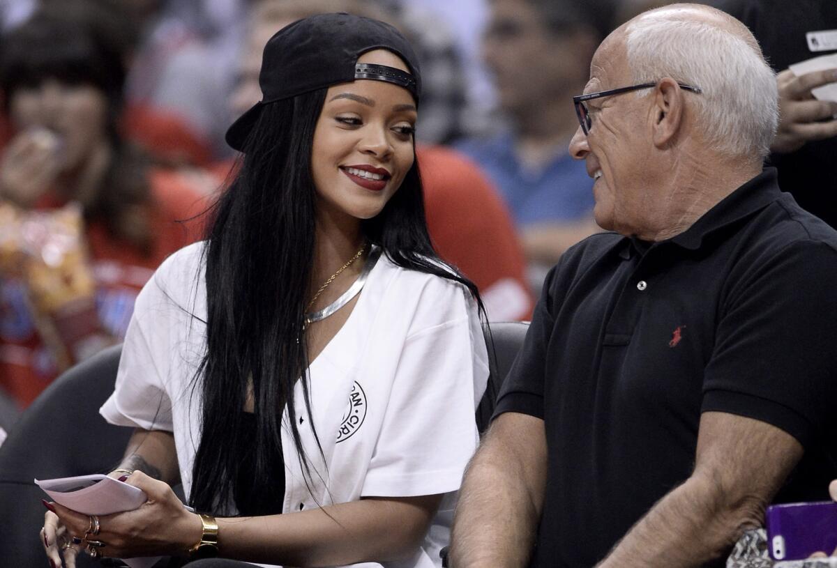 Rihanna chats with L.A. Police Commission President Steve Soboroff during the May 9 game between the Clippers and the Oklahoma City Thunder at Staples Center.