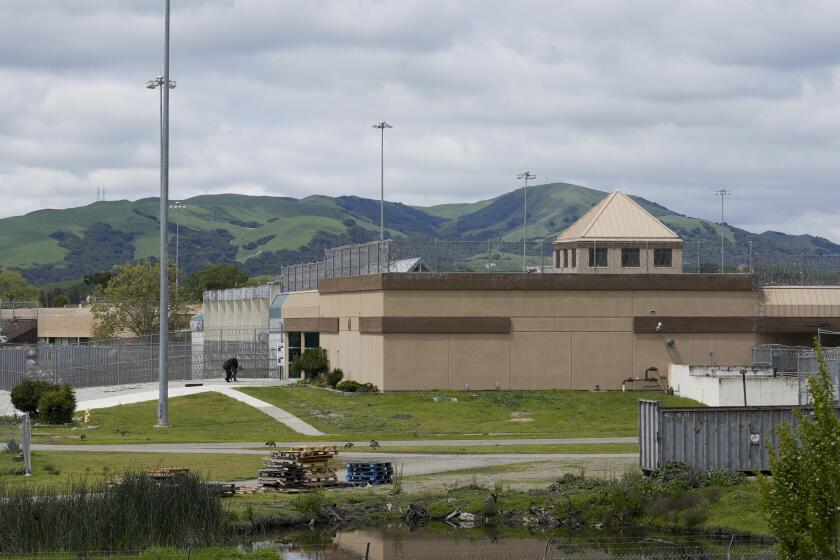 FILE - The Federal Correctional Institution is seen in Dublin, Calif., Monday, April 15, 2024. Nearly all inmates have been transferred out of the troubled women's prison set to be shut down in California, and U.S. senators on Wednesday, April 24, demanded an accounting of the rapid closure plan for the facility where sexual abuse by guards was rampant. (AP Photo/Terry Chea, File)