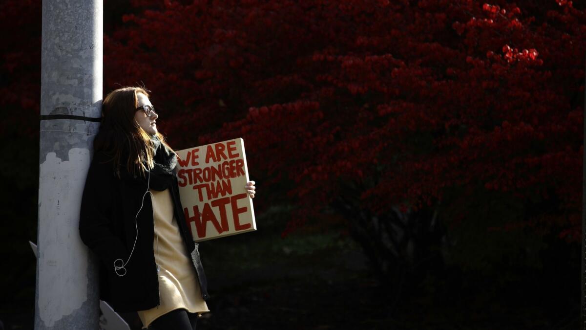 A demonstrator waits for the start of a protest in the aftermath of the mass shooting at Pittsburgh's Tree of Life Synagogue late last month.
