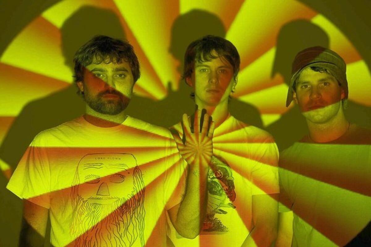 ANIMAL COLLECTIVE: Brian Weitz, left, Noah Lennox and Dave Portner included pan flute performed by Gheorghe Zamfir in their 2009 song "Glaze."