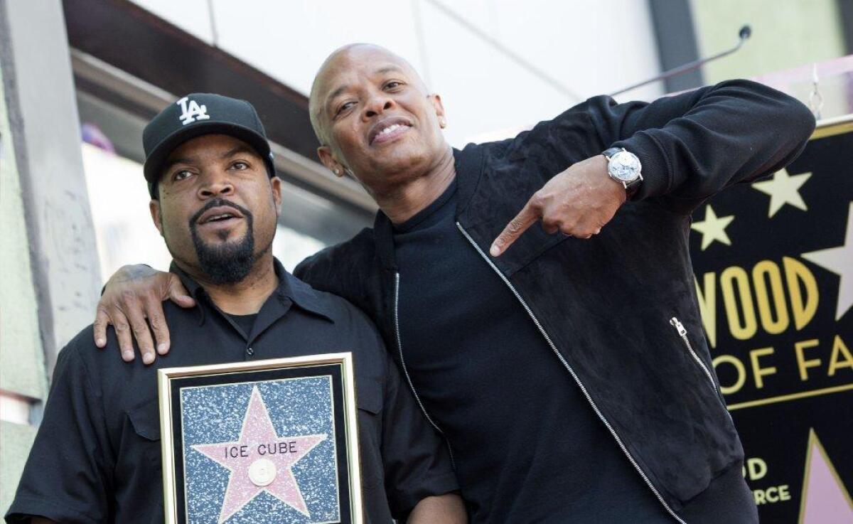 Ice Cube, left, with fellow N.W.A member Dr. Dre at Ice Cube's Walk of Fame ceremony.