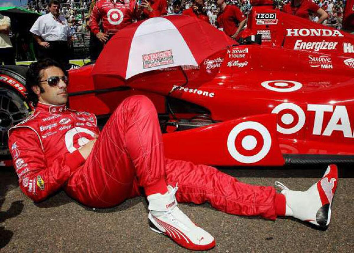 Dario Franchitti celebrates winning the Izod Indycar Series Championship  after the Cafes do Brasil Indy 300 race at Homestead Miami Speedway in  Homestead, Florida, Saturday, October 2, 2010. (Photo by Michael  Laughlin/Sun