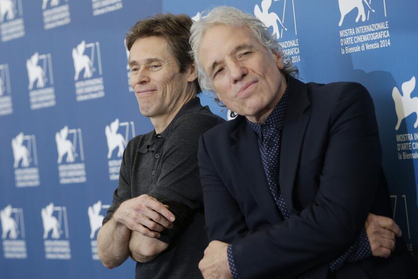 Director Abel Ferrara, right, and actor Willem Defoe at the 71st edition of the Venice Film Festival in Venice Sept. 4, 2014.