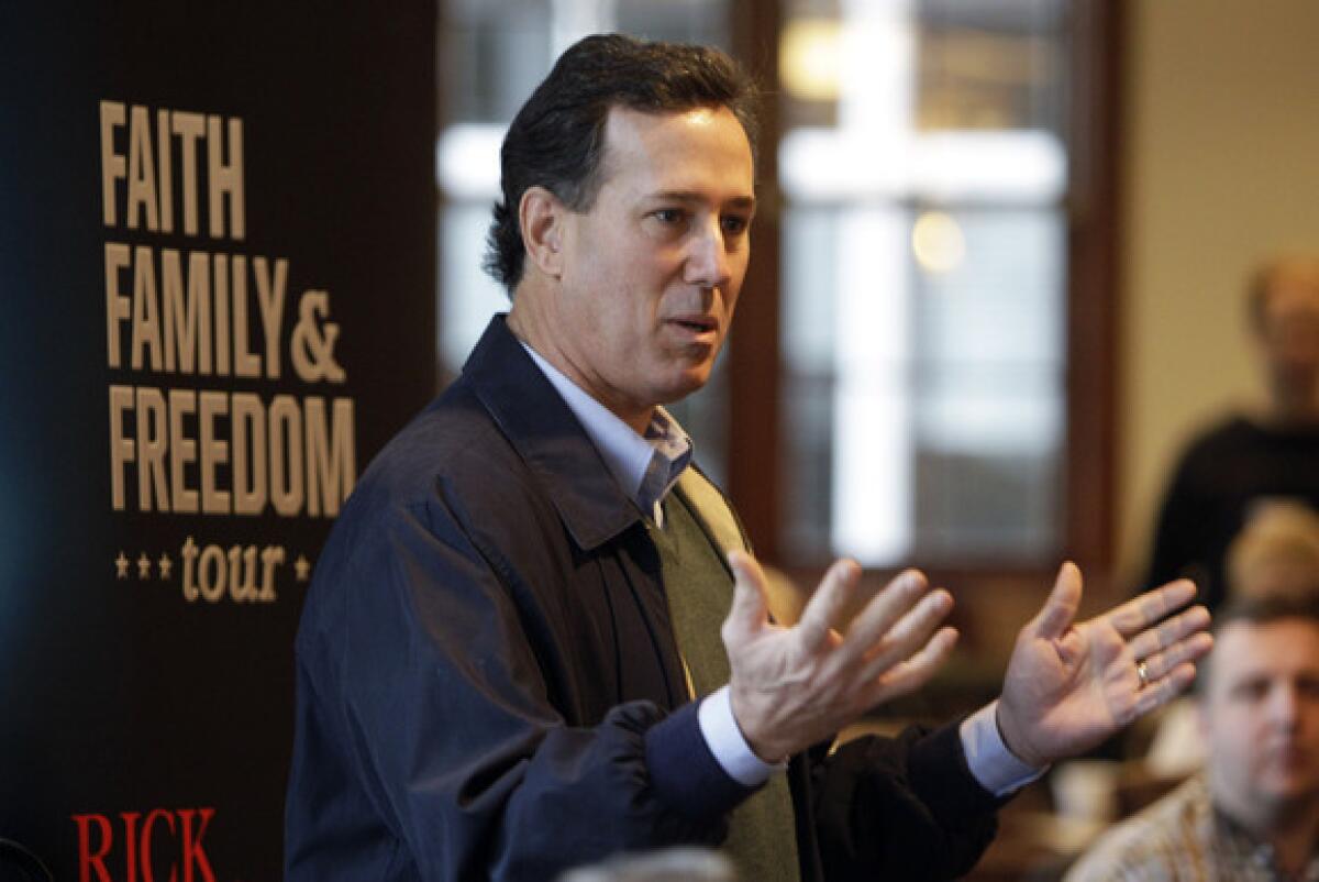 Rick Santorum speaks during a campaign stop Tuesday in Pella, Iowa.