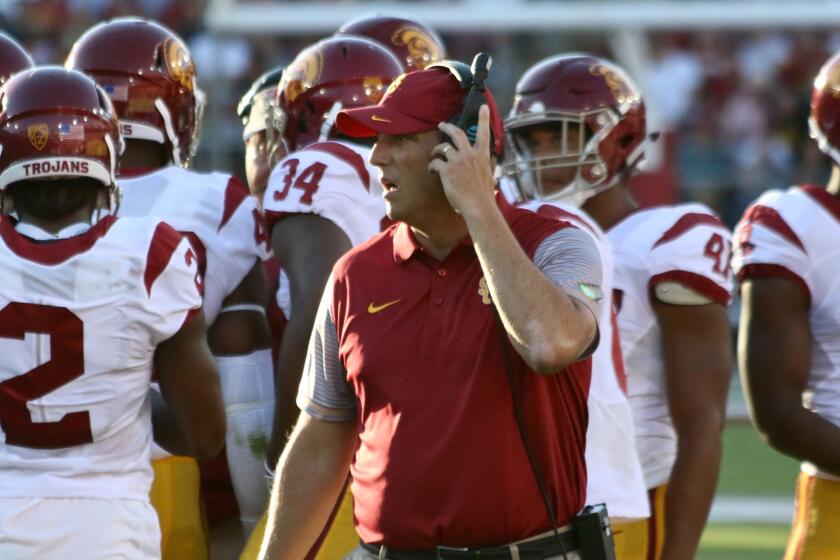USC Coach Clay Helton tried to keep the Trojans on an even keel during a rugged early part of the season.