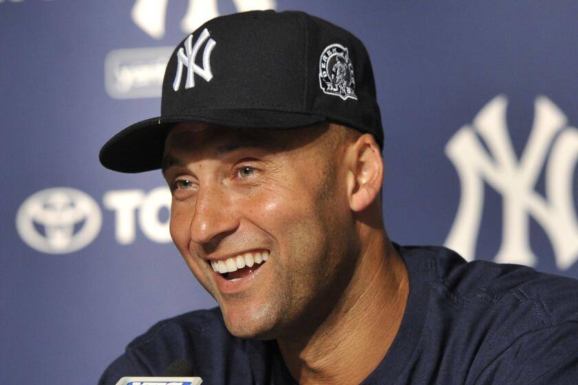 FILE - In this July 9, 2011, file photo, New York Yankees' Derek Jeter smiles as he speaks about his 3,000th career hit at a press conference after a baseball game against the Tampa Bay Rays, at Yankee Stadium in New York. Jeter could be a unanimous pick when Baseball Hall of Fame voting is announced Tuesday, Jan. 21, 2020. (AP Photo/Kathy Kmonicek)