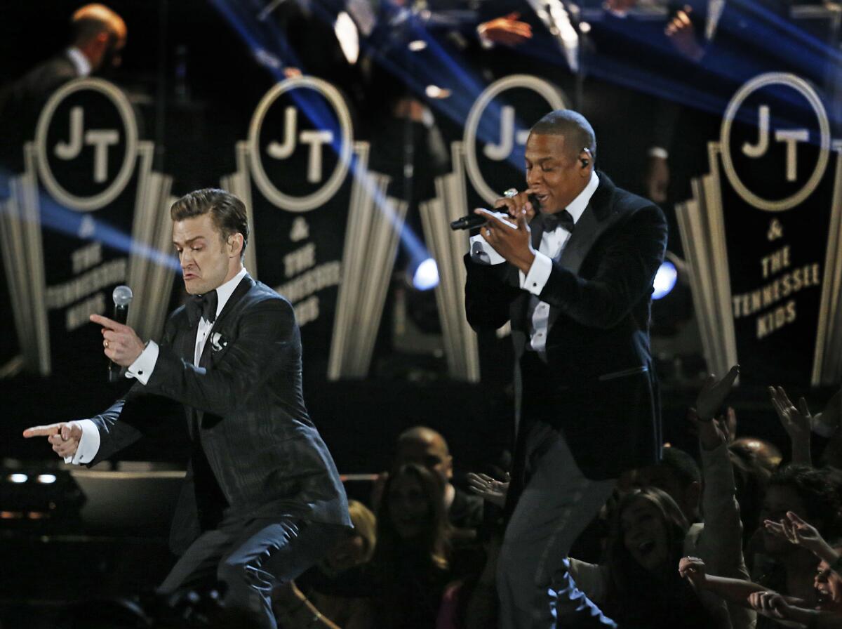 Justin Timberlake, left, performs "Suit & Tie" with Jay-Z at the 55th Grammy Awards on Sunday night.