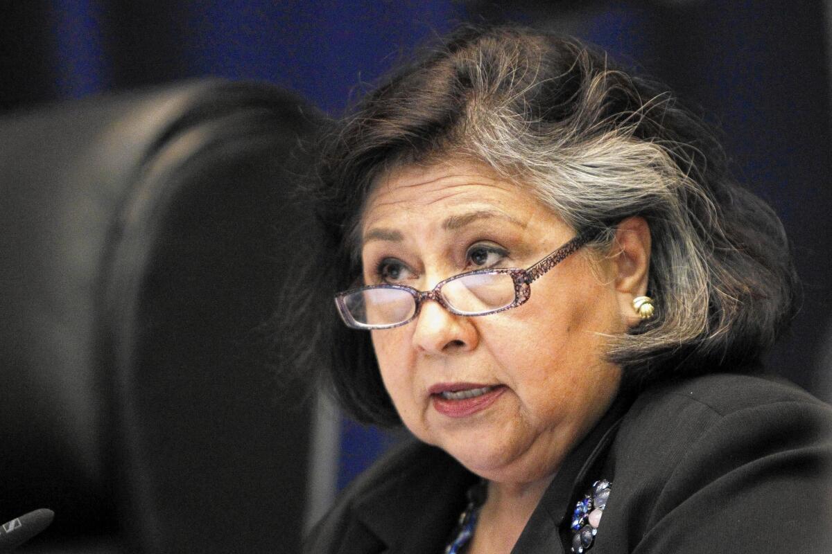 Los Angeles County Supervisor Gloria Molina announced that she will challenge City Councilman Jose Huizar in next year's election, dramatically rearranging a contest that looked like an easy one for the incumbent.