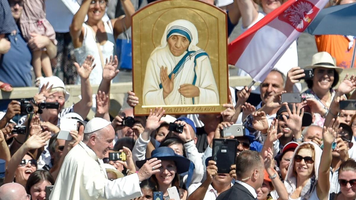 Pope Francis leaves after the canonization of Mother Teresa in St. Peter's Square in the Vatican.
