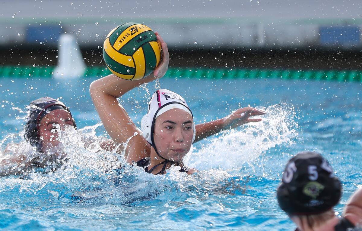 Corona del Mar's Audrey Long pulls away from her defender for a look during Saturday's match.