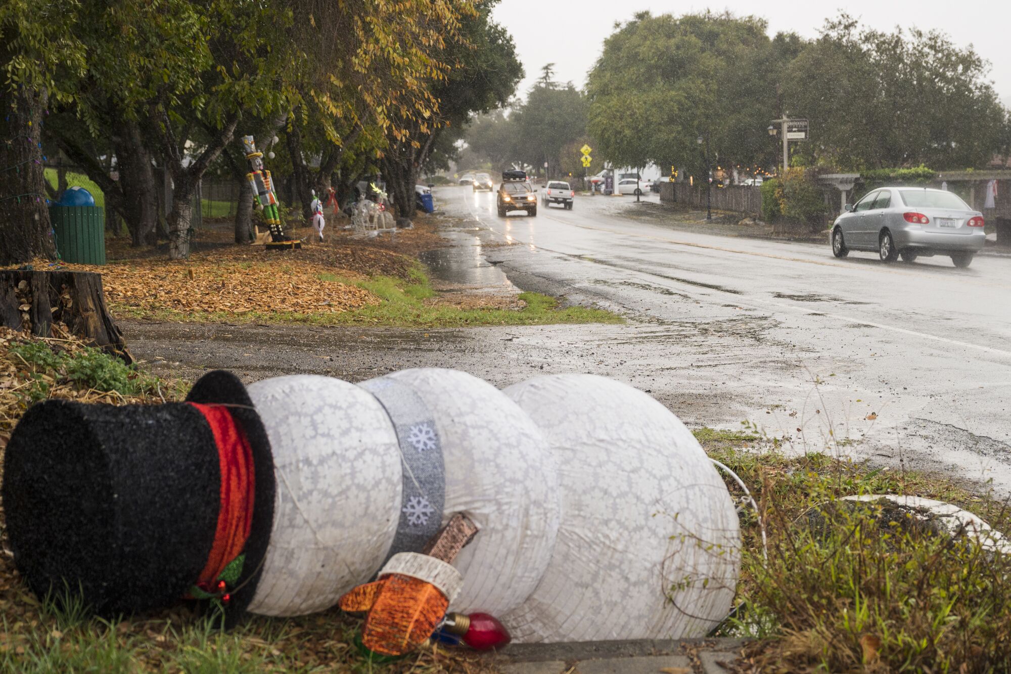 Winds toppled Christmas decorations in Carmel Valley, Calif.