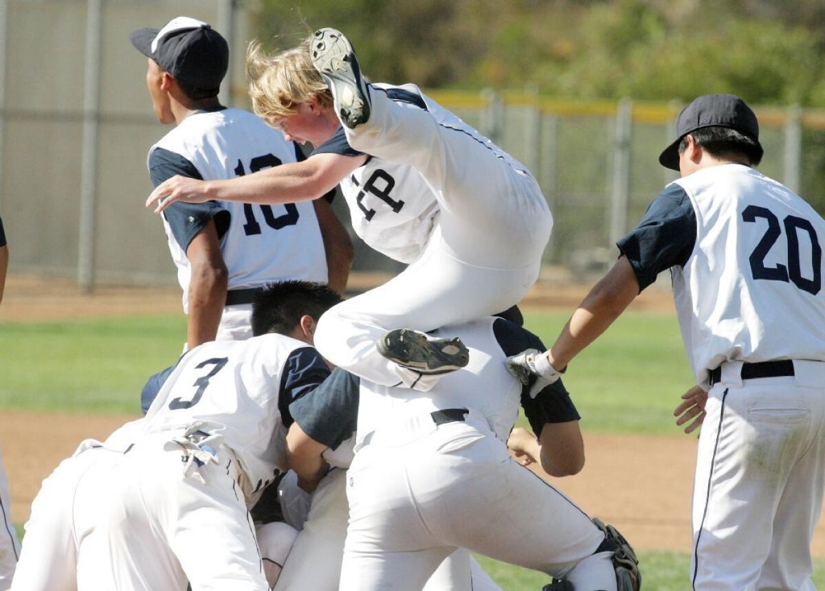 Flintridge Prep's baseball team celebrates its 7-6, eight-inning win over Salesian in the CIF Southern Section Division VI quarterfinals.