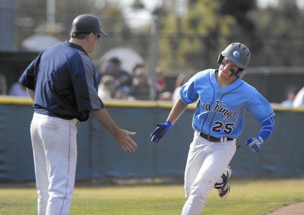 Corona del Mar High's Preston Hartsell rounds third base after hitting a solo home run against Beckman on Thursday.