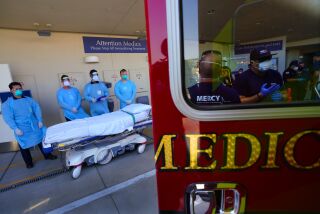 La Mesa, CA - August 12: At the ambulance bay at Sharp Grossmont Hospital on Thursday, Aug. 12, 2021 in La Mesa, CA., emergency room nurse wait for paramedics to unload and transfer the patient to the ER. (Nelvin C. Cepeda / The San Diego Union-Tribune)