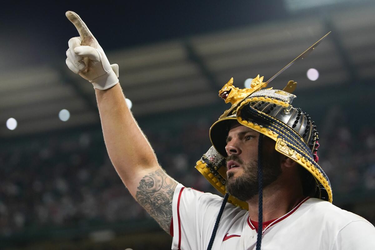Angels' Mike Moustakas celebrates after hitting a three-run home run against the Houston Astros on July 15, 2023, in Anaheim.