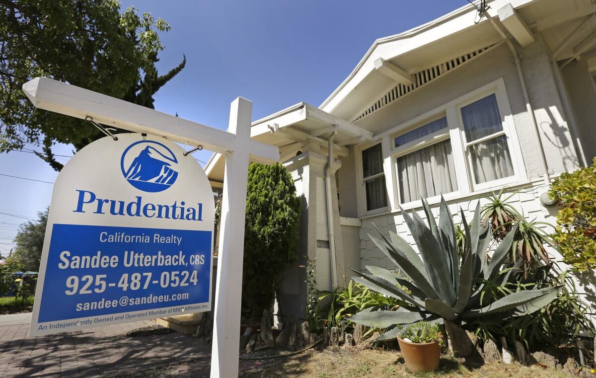Home prices in the nation's largest cities climbed 9.3% in May, the smallest gain since February 2013. Above, a home for sale this month in Alameda, Calif.