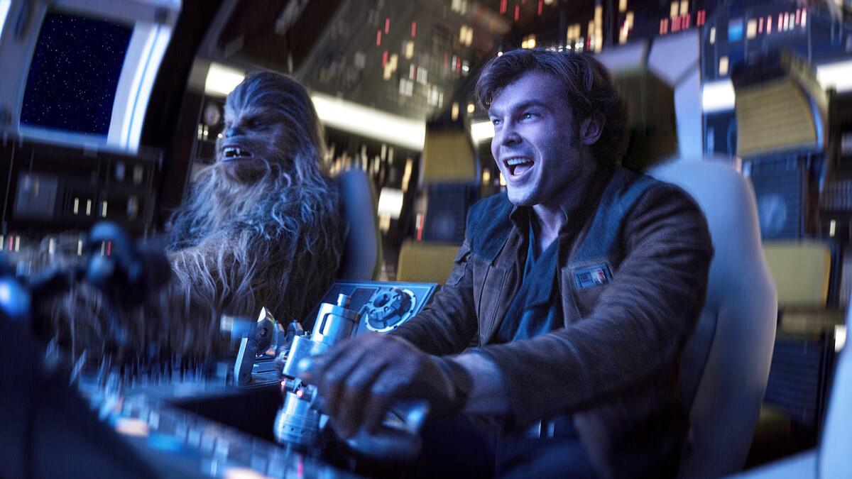 Alden Ehrenreich as Han Solo, right, and Joonas Suotamo as Chewbacca in "Solo: A Star Wars Story."