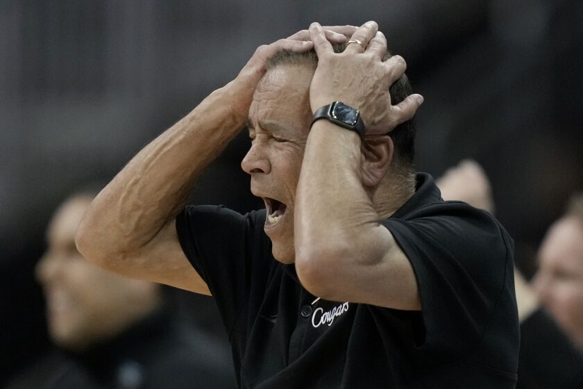 Houston head coach Kelvin Sampson reacts in the second half of a Sweet 16 college basketball game against Miami in the Midwest Regional of the NCAA Tournament Friday, March 24, 2023, in Kansas City, Mo. (AP Photo/Charlie Riedel)