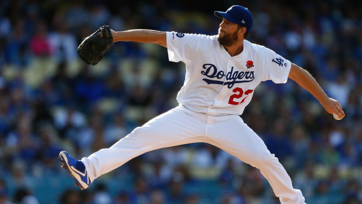 Dodgers starting pitcher Clayton Kershaw (22) pitches against the New York Mets.