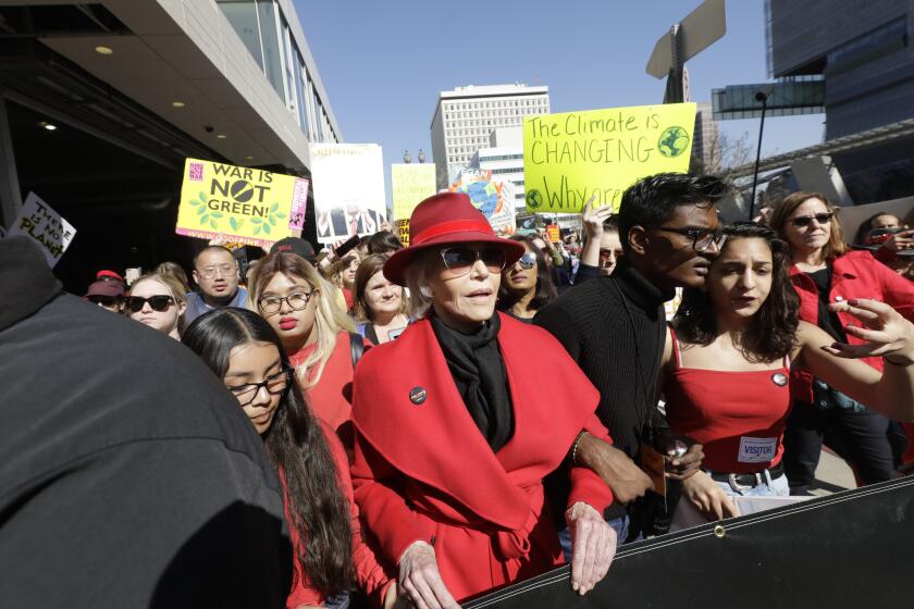 LOS ANGELES, CA -- FEBRUARY 07, 2020: Jane Fonda joins protestors in a march during her Friday Fire Drill that began at Los Angeles City Hall to address climate change and oil drilling. (Myung J. Chun / Los Angeles Times)