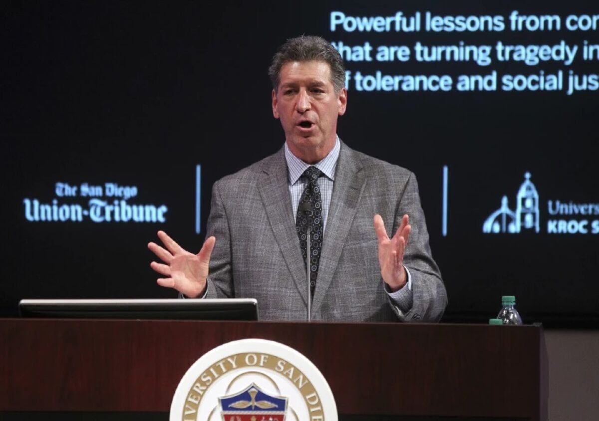 Steven Dinkin, president of the Conflict Resolution Center, speaks during a 2019 event in San Diego.
