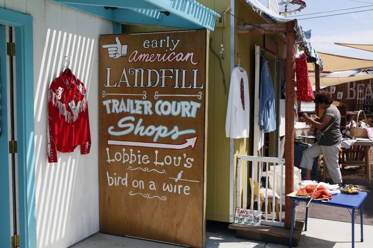 Is it a style? A period? A store? All of the above? Early American Landfill sells clothing, cards and art.