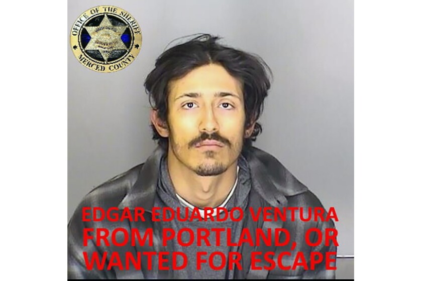 This undated booking photo released by the Merced County Sheriff's Office shows escapee inmate Edgar Eduardo Ventura, from Portland, Ore. Authorities in central California are searching for six inmates, including Ventura, who used a "homemade rope" to escape from a county jail. The Merced County Sheriff's Office says all six should be considered armed and dangerous. Staff at Merced County Downtown Jail noticed late Saturday, Jan.10, 2021, that the six inmates were missing. (Merced County Sheriff's Office via AP)