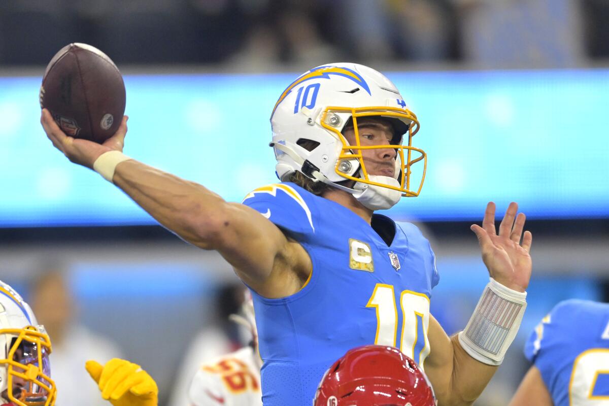 Chargers quarterback Justin Herbert passes during the first quarter.