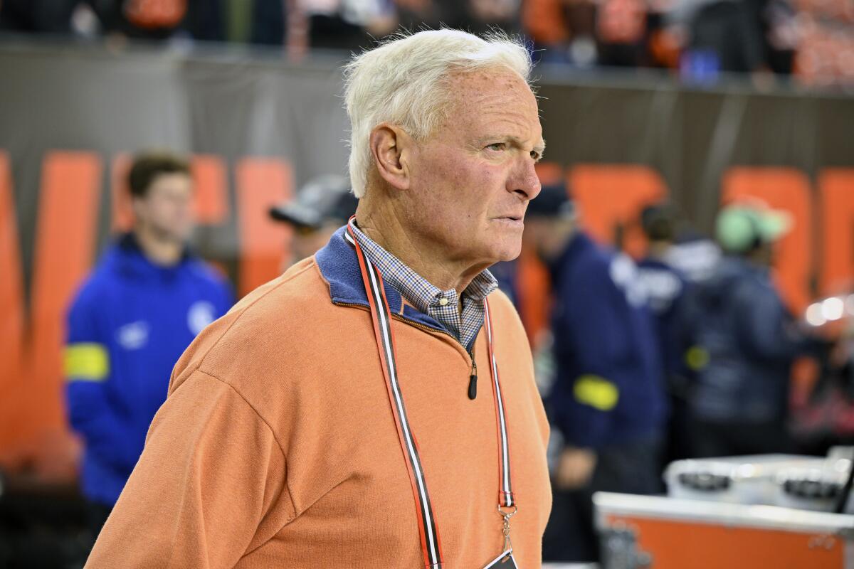 FILE - Cleveland Browns owner Jimmy Haslam walks on the field before an NFL football game against the Pittsburgh Steelers, Thursday, Sept. 22, 2022, in Cleveland. An attorney who was arrested for throwing a water bottle at Cleveland Browns owner Jimmy Haslam at the end of a home game last month has been charged with misdemeanor disorderly conduct by intoxication. Jeffrey Miller, 51, of Rocky River, is scheduled to appear in Cleveland Municipal Court on Oct. 20. A message seeking comment was left with Miller on Friday, Oct. 7. He was charged on Thursday. (AP Photo/David Richard, File)
