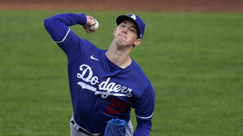 Dodgers pitcher Walker Buehler throws a pitch against the Cleveland Indians.