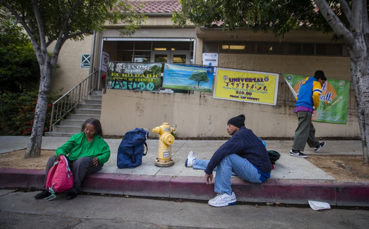 Tyrone Dixon with other homeless people at the Echo Park Community Center