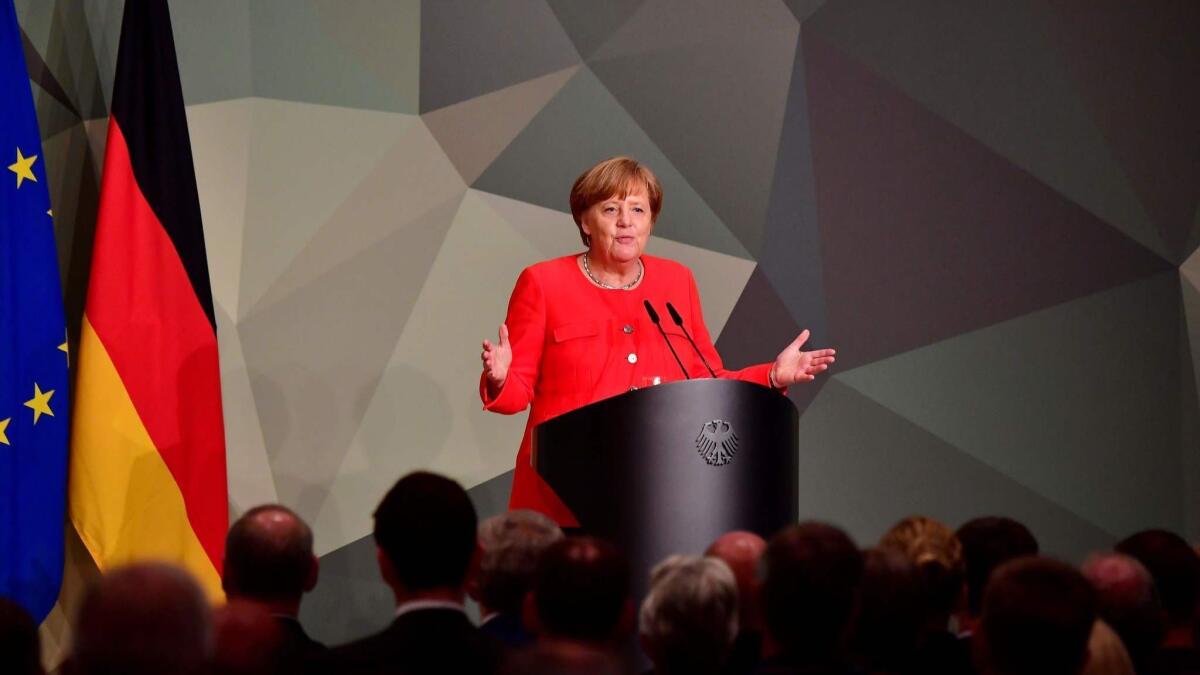German Chancellor Angela Merkel delivers a speech on defense policy with top military brass in Berlin on May 14.