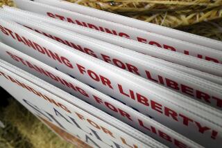 Republican political signs are displayed at the Niobrara County Fair in Lusk, Wyo., on July 31, 2024. (AP Photo/Thomas Peipert)