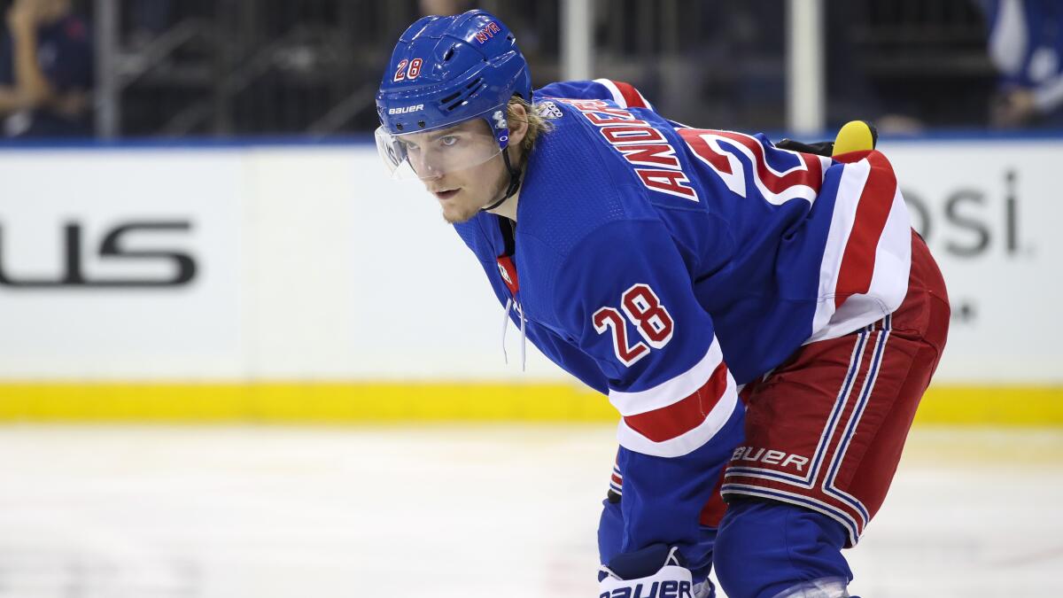 New York Rangers center Lias Andersson lines up for a face-off.