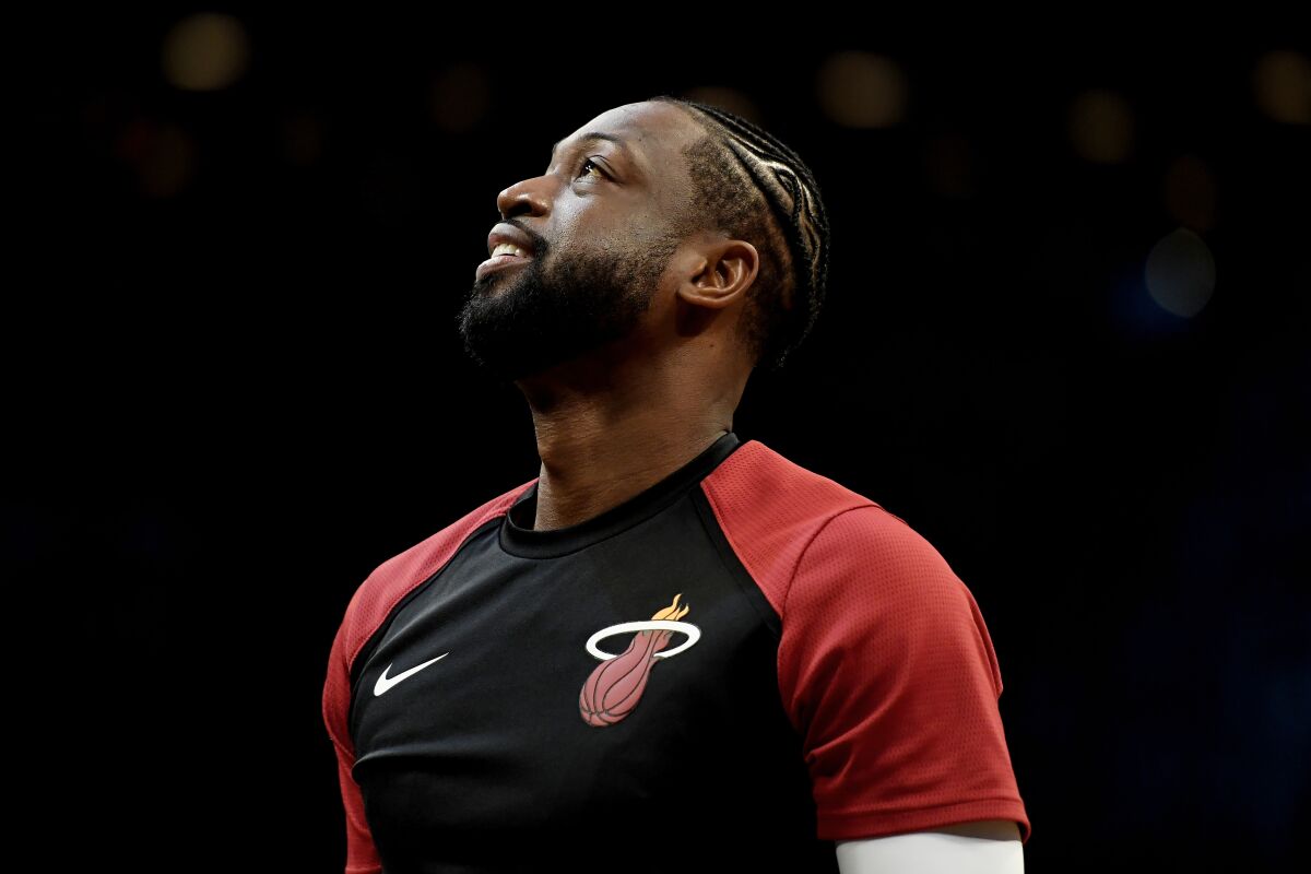 Dwyane Wade looks on before the Heat faced the Nets on April 10 in the final game of his NBA career.