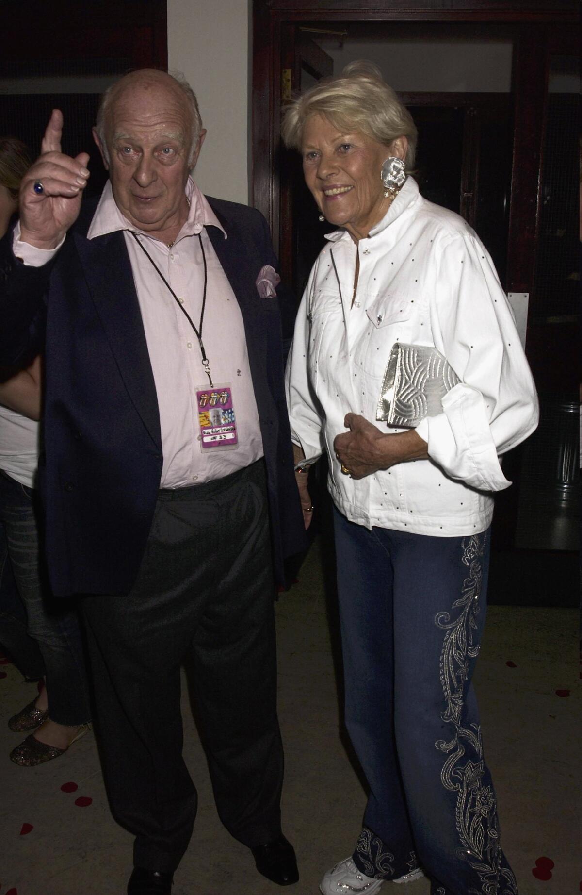 Prince Rupert Loewenstein and his wife attend the 2003 Rolling Stones end of tour party in London.