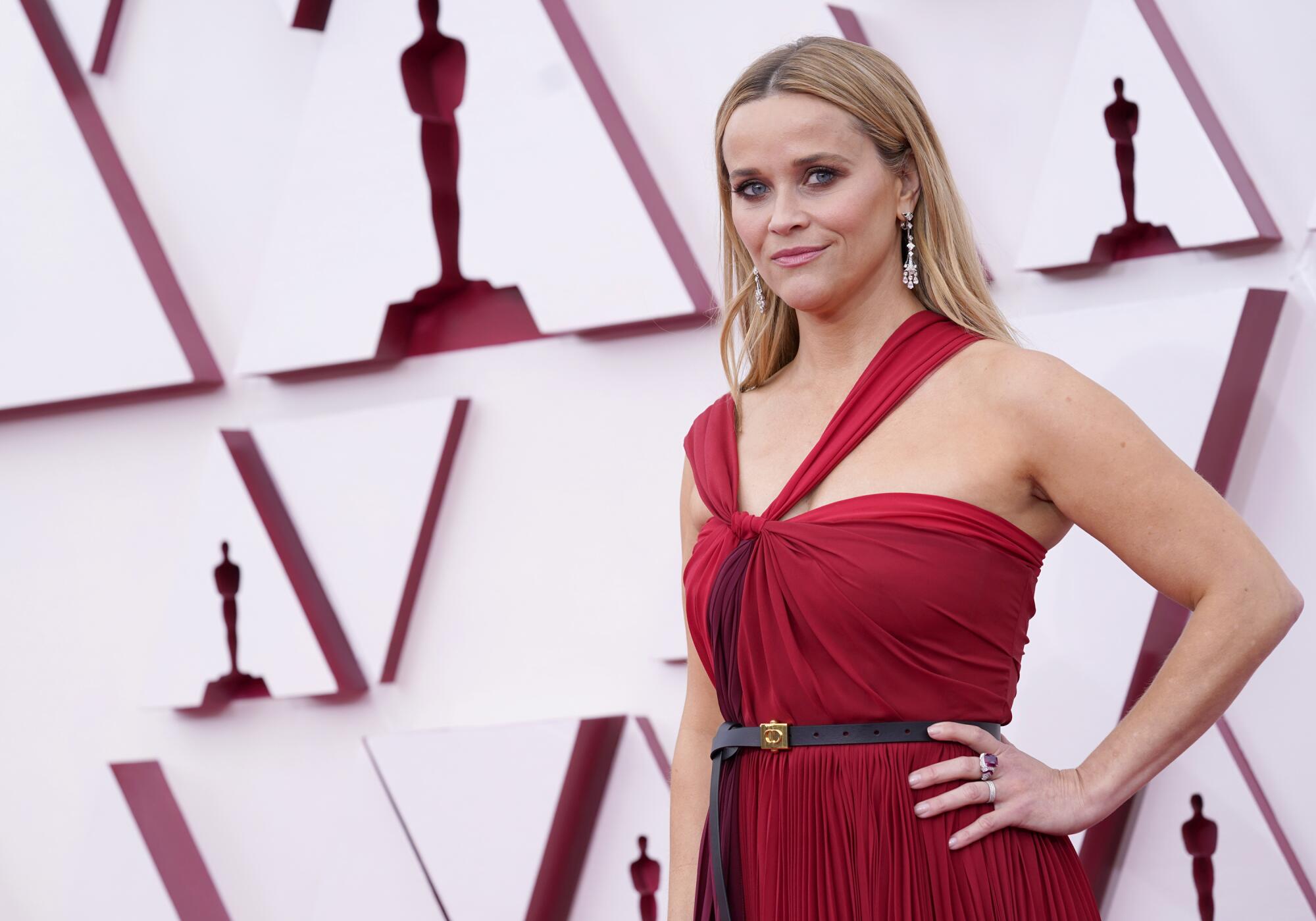 Reese Witherspoon in a Grecian-style dark red gown