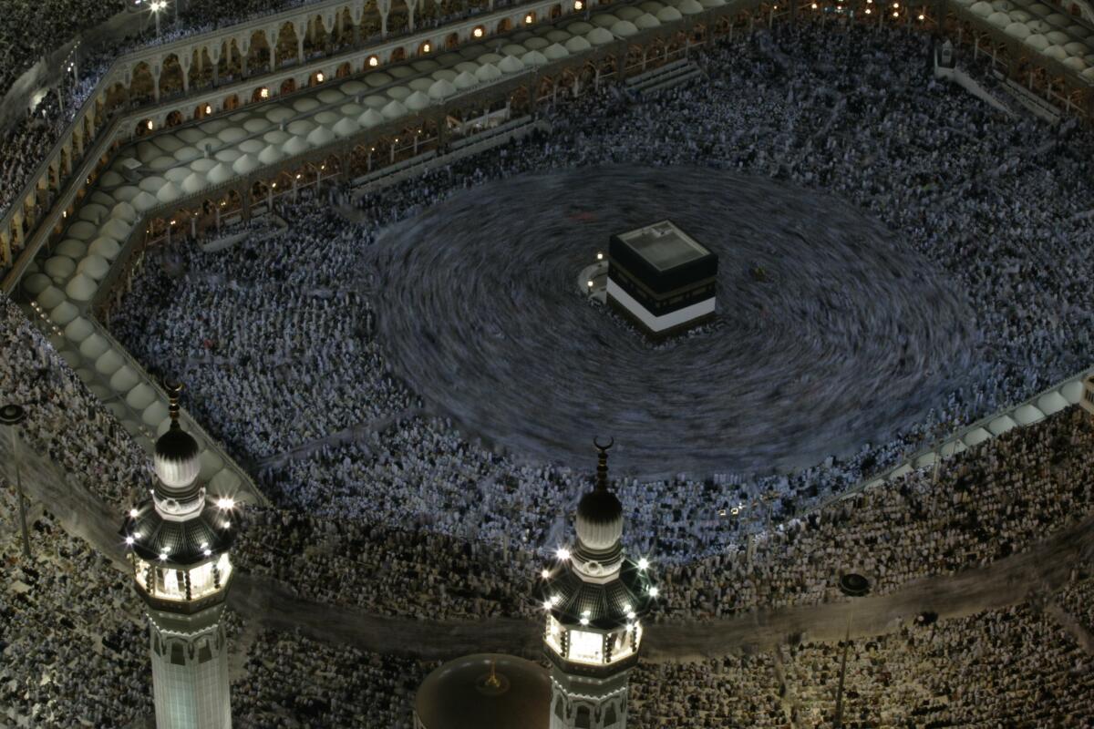 Hajj pilgrims in Mecca, Saudi Arabia, crowd inside the massive Grand Mosque and flood the surrounding streets on Dec. 14, 2007