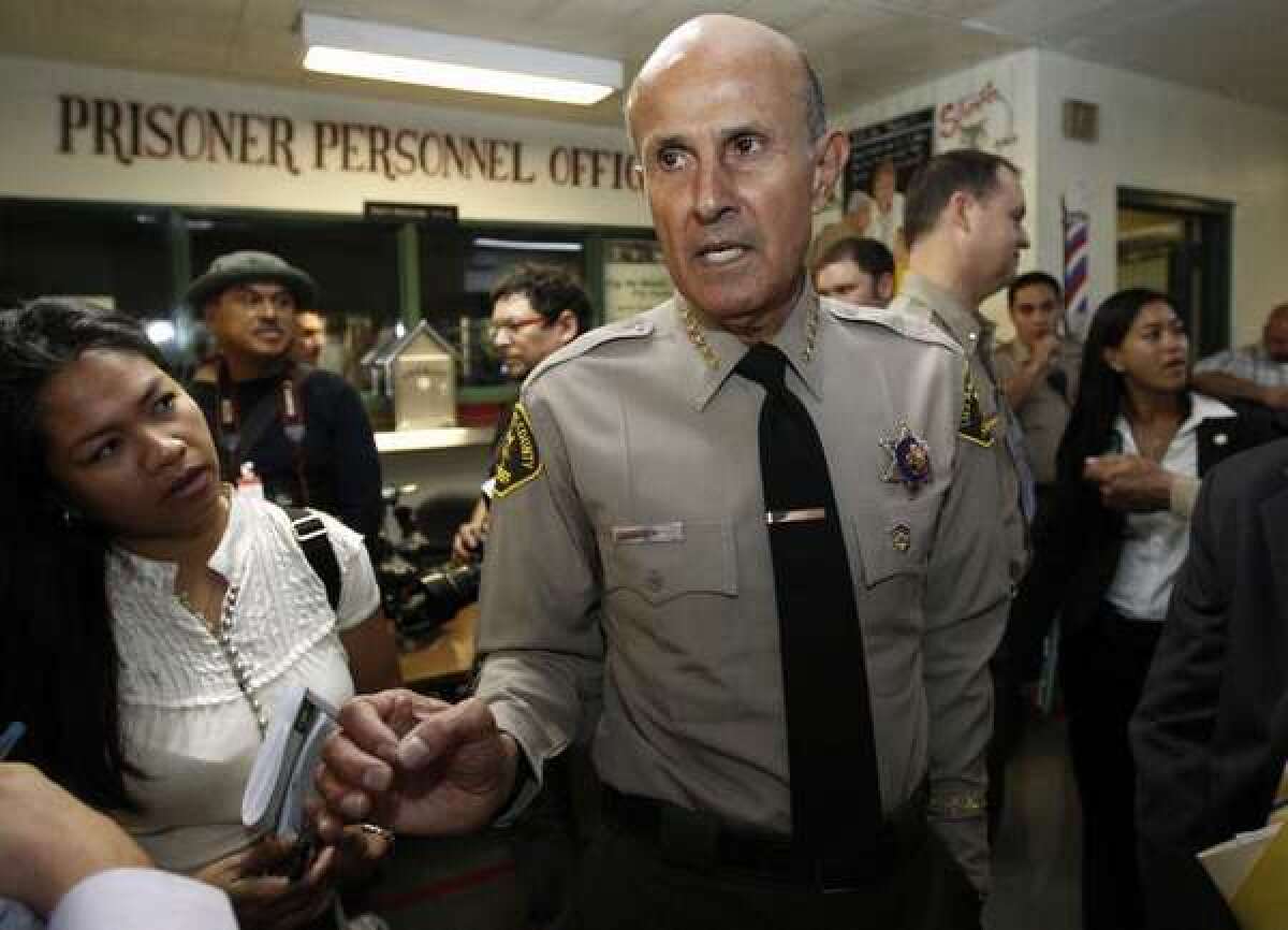Los Angeles County Sheriff Lee Baca, who is supervises the largest jail system in the nation, talks to reporters at the Men's Central Jail in downtown L.A. on Oct. 3.