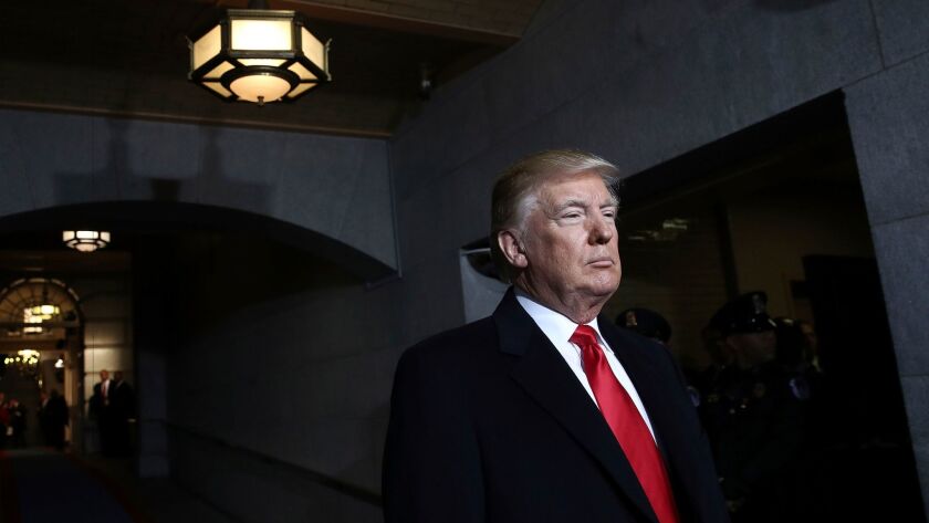 Donald Trump waits to be inaugurated as the 45th U.S. president at the Capitol in Washington on Jan. 20, 2017.