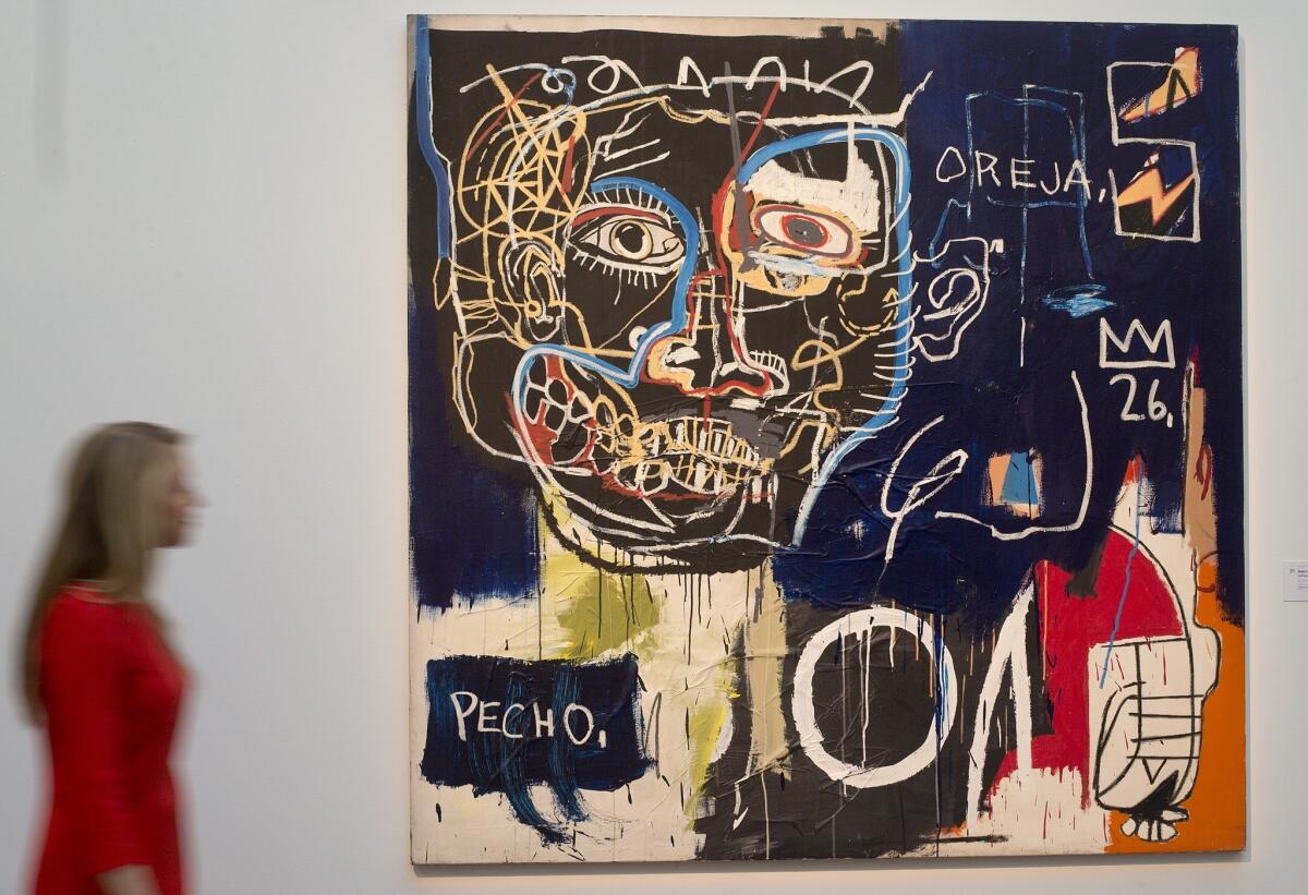 Jean-Michel Basquiat's "Untitled (Pecho/Oreja)" on display at Sotheby's auction house in London.