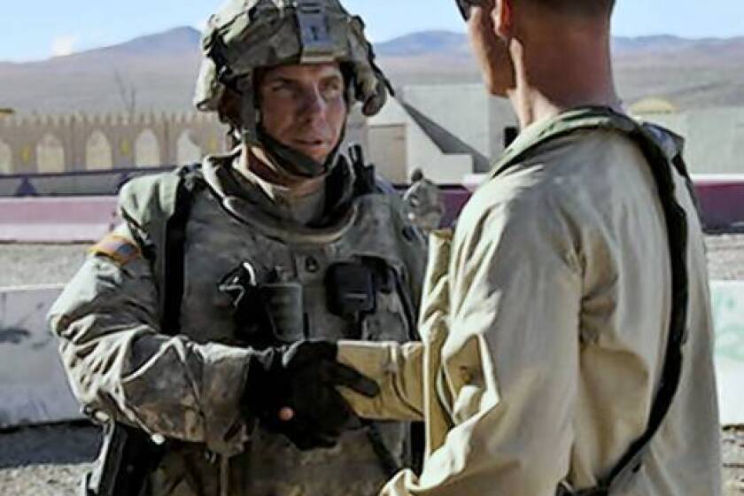 Army Staff Sgt. Robert Bales, left, is shown at Ft. Irwin in 2011.