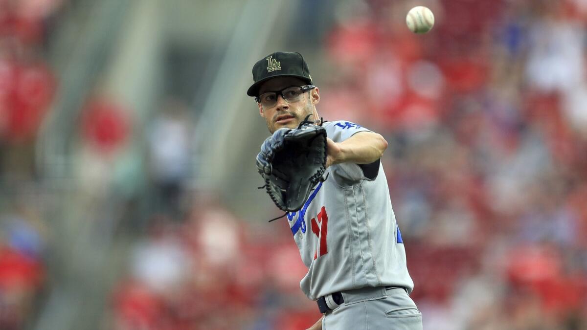 Dodgers' Joe Kelly pitches during a game against the Cincinnati Reds on May 18 in Cincinnati.