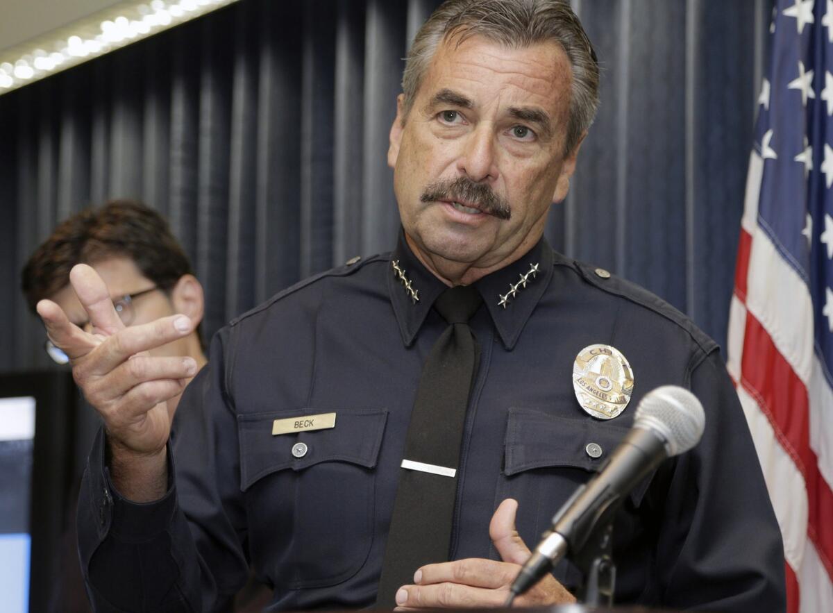 Los Angeles Police Chief Charlie Beck speaks during a news conference on Sept. 2. Earlier this year, Beck attributed part of a recent rise in violent crime to a spike in domestic abuse cases.