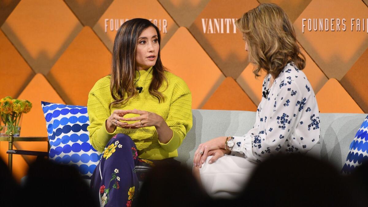 Stitch Fix founder and Chief Executive Katrina Lake, left, speaks at Vanity Fair's Founders Fair in 2018.