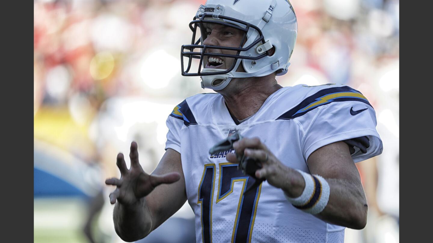 Philip Rivers reacts after throwing an apparent interception during the second half against the Chiefs. Video replay showed it to be an incomplete pass.