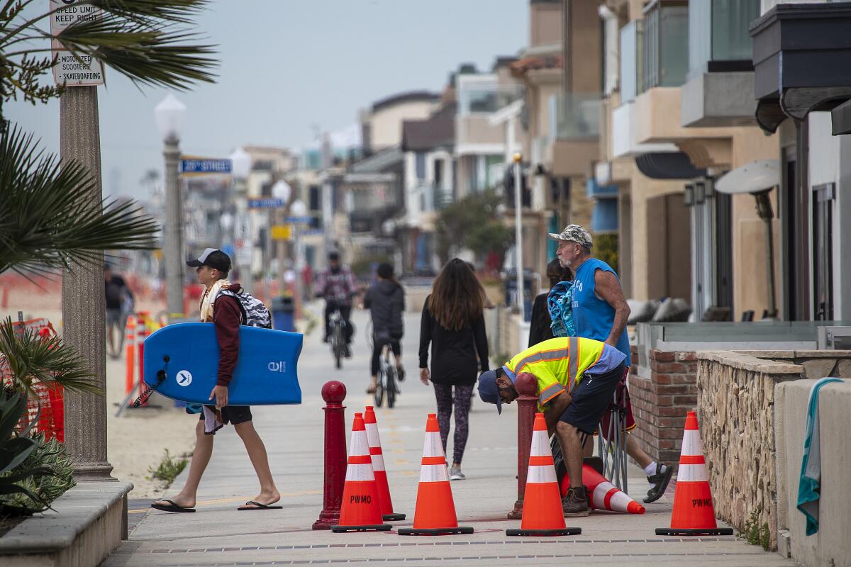 Coronavirus social distancing regulations are in effect in Newport Beach, shown March 31.