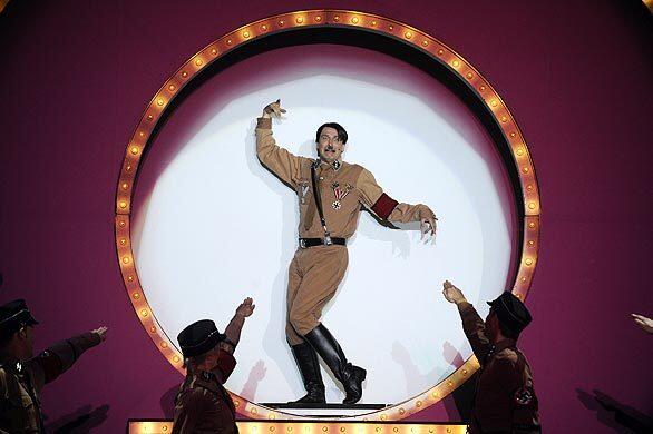 In the U.S., a record 12 Tony Awards were bestowed on the stage version of Mel Brooks' 1968 film comedy "The Producers." So how will a show with a purposely in-bad-taste production number called "Springtime for Hitler" go over in Berlin? The German city is getting its first look at the 2001 show. Martin Sommerlatte dons Hitler garb for that big song-and-dance number.